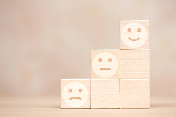 istock Wooden cubes with emotions. Customer satisfaction concept. 1403293948