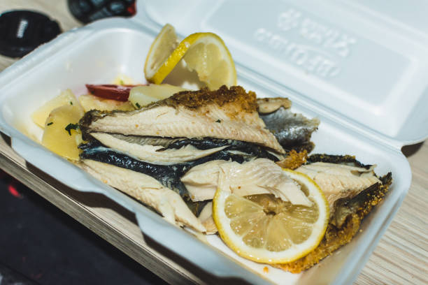 istock Trout with lemon in white casserole 1403294858