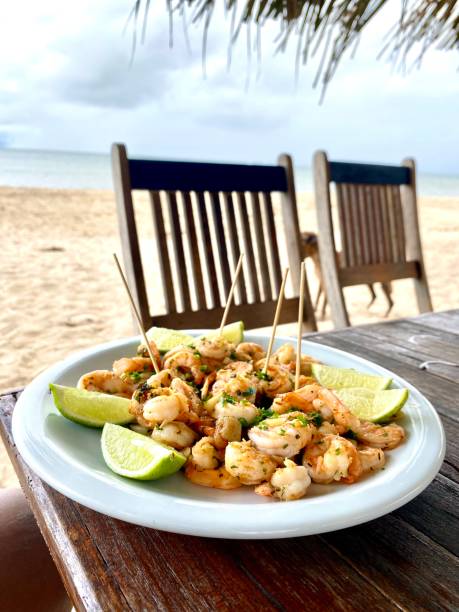 istock Brazilian food and drinks on the beach 1403295259
