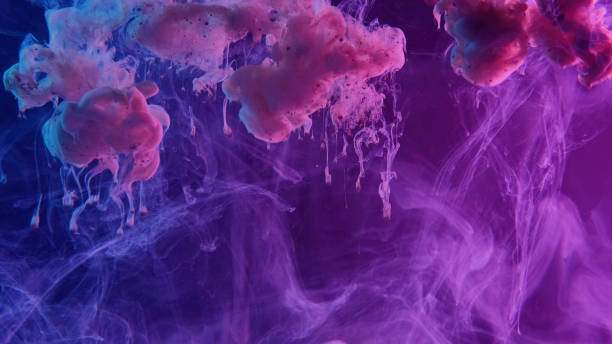 istock paint water drop color smoke cloud neon steam flow 1403295963