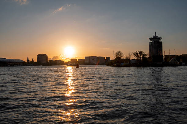 istock Harbor from Amsterdam in the Netherlands at sunset 1403296297