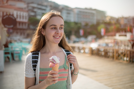 Traveller buying ice-cream at a street