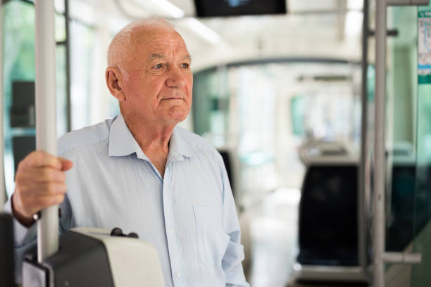 istock Old man in streetcar 1403299360