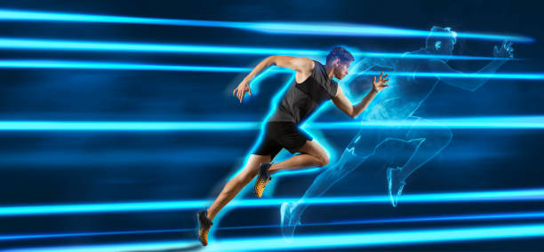 istock Sporty young man running on blue neon background 1403300844