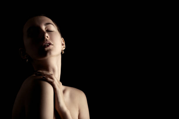 istock sensual girl in dark 1403301178