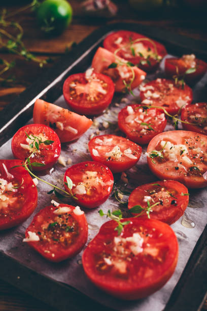 istock Preparation of Sun-dried Tomatoes with Thyme and Garlic 1403303197