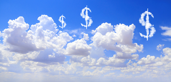Money making. US dollar signs in the clouds. Clouds shaped as USA dollar currency symbols. Dollar symbol made of cloud. Business, development and prosperity concept