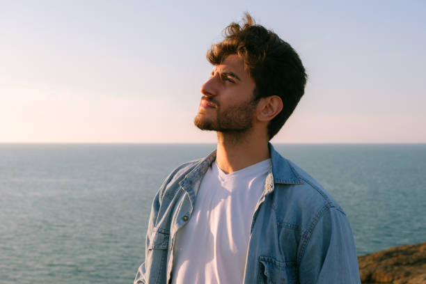 istock Man looking away portrait at sunset 1403307160