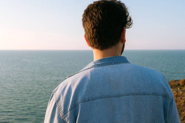 istock Man looking away portrait at sunset 1403307186