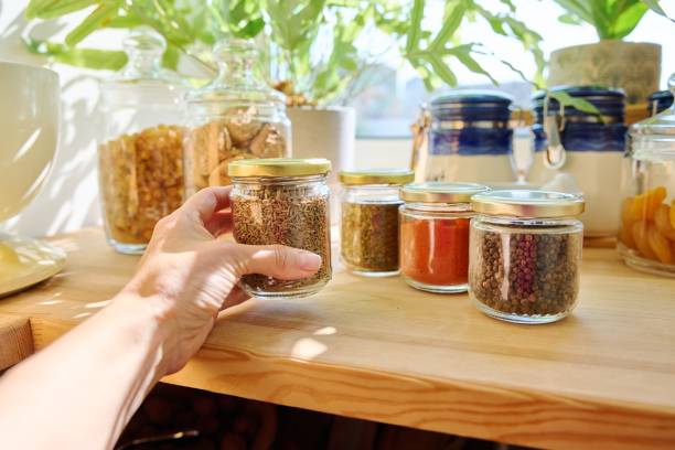istock Jars with different spices in the kitchen, zira close-up 1403307991