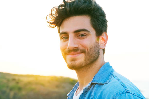 istock Man smiling portrait outdoor 1403308027
