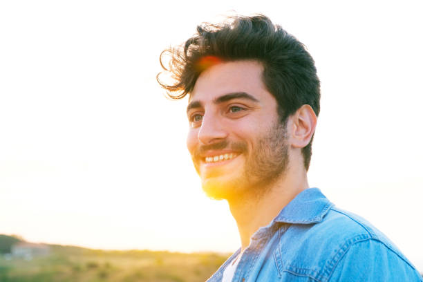 istock Man smiling portrait outdoor 1403308032