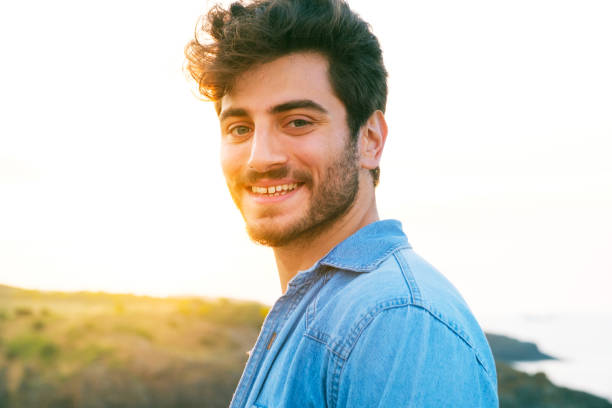istock Man smiling portrait outdoor 1403308042