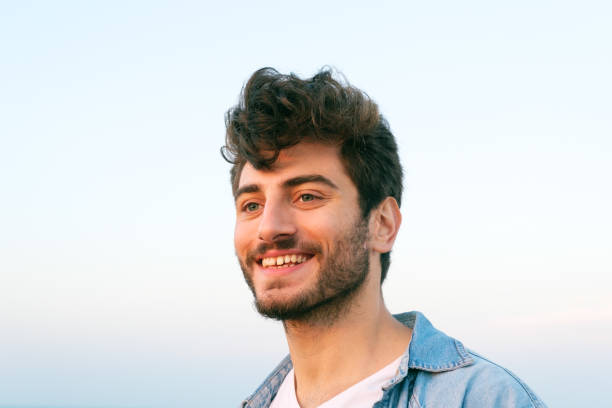 istock Man smiling portrait outdoor 1403308046