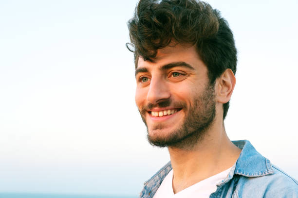 istock Man smiling portrait outdoor 1403308050