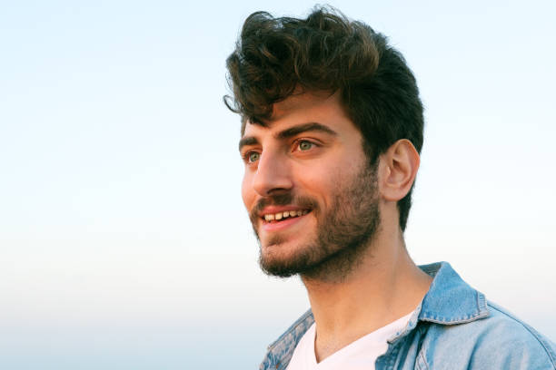 istock Man smiling portrait outdoor 1403308056