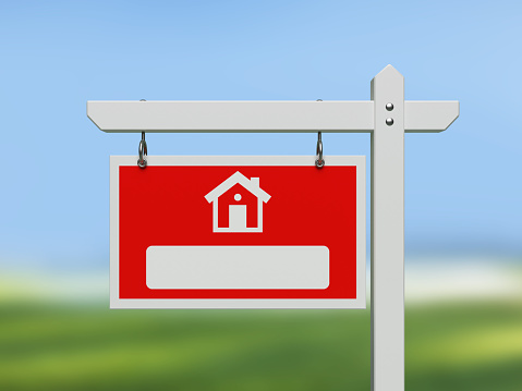 Real estate sign and house icon. Horizontal composition with copy space. Isolated with clipping path.