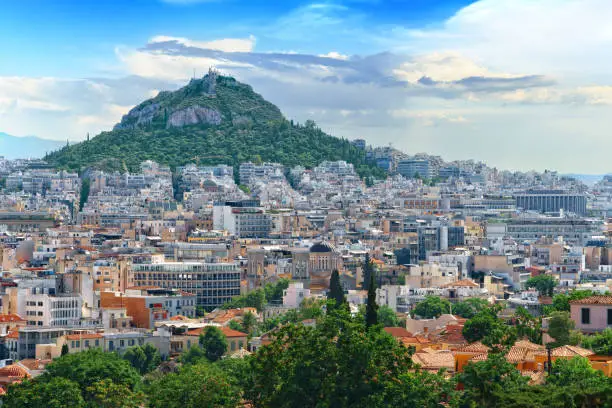 Photo of Beautiful cityscape of the Greek capital - Athens city against the backdrop of Mount Lycabettus
