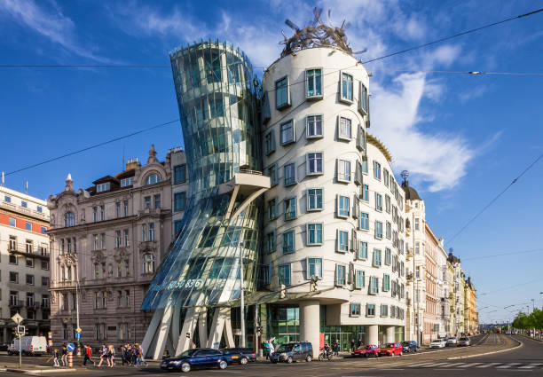 Prague Dancing modern house named "Fred and Ginger" Prague, Czech Republic - June 12, 2022: Prague Dancing modern house named "Fred and Ginger" dancing house prague stock pictures, royalty-free photos & images