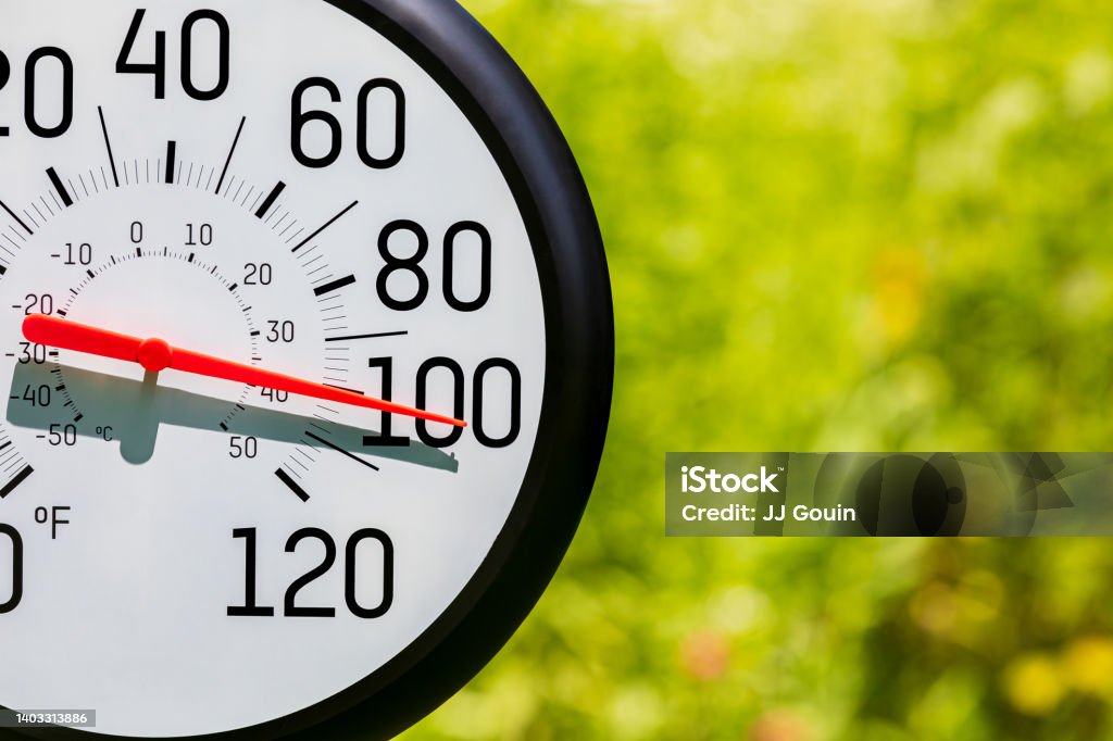 Outdoor thermometer in the sun during heatwave. Hot weather, high temperature and heat warning concept. summer, heatwave, copy space, no people Heat - Temperature Stock Photo