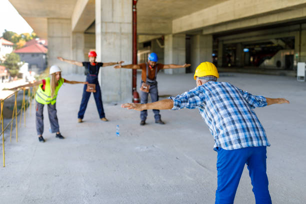 istock A Group of Multicultural Workers are Exercising During a Work and Stretching a Muscles. 1403320035