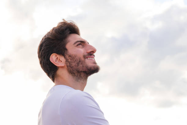 istock Man looking away portrait at sunset 1403321478
