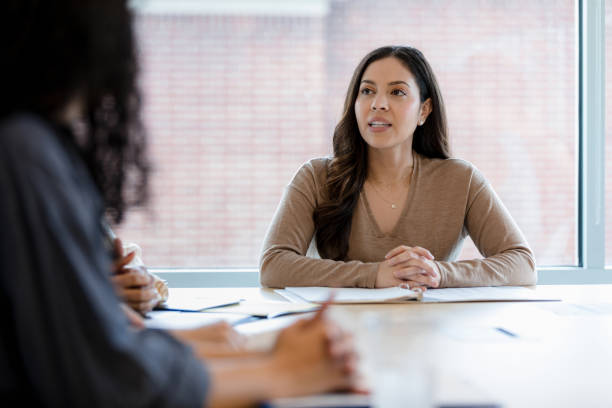 istock Financial expert gives her feedback 1403322589