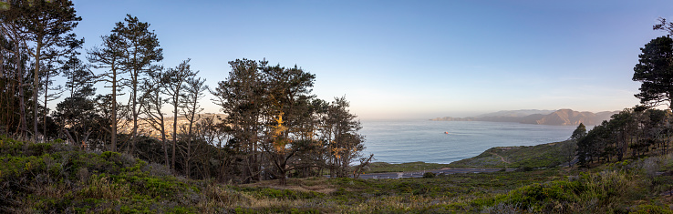 panoramic sunrise in San Francisco seen from Presidio park with bay view