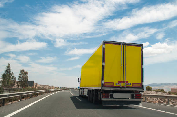 istock Freight trailer on the road 1403329319