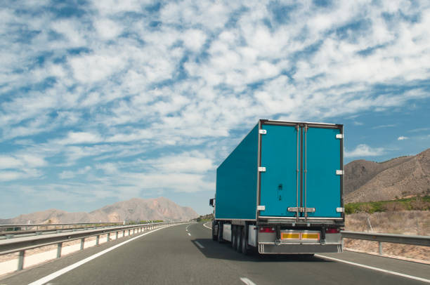 istock Freight trailer on the road 1403329339
