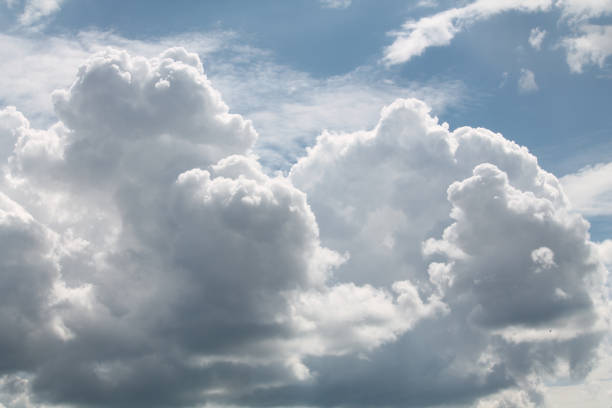 istock Abstract background with white clouds and blue sky 1403333925