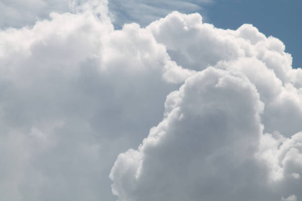 istock Abstract background with white clouds and blue sky 1403334960