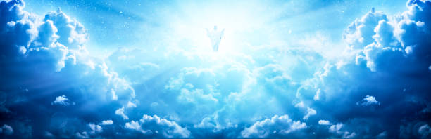 Jesus Christ In The Clouds Jesus Christ In The Clouds Of Heaven With Brilliant Light - Ascension / Christ Return god and jesus stock pictures, royalty-free photos & images