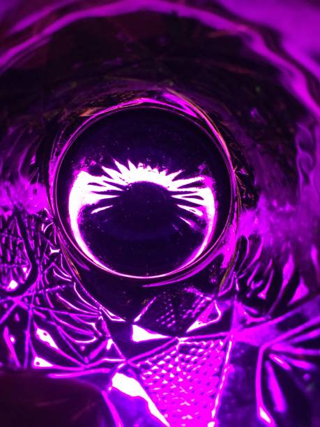 Neon Light Through Glass Shapes on Dark Background. Lazer Light Pass through the glass. Night Club Light.