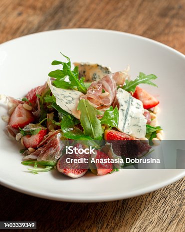 istock Prosciutto di Parma salad with figs and blue cheese 1403339349
