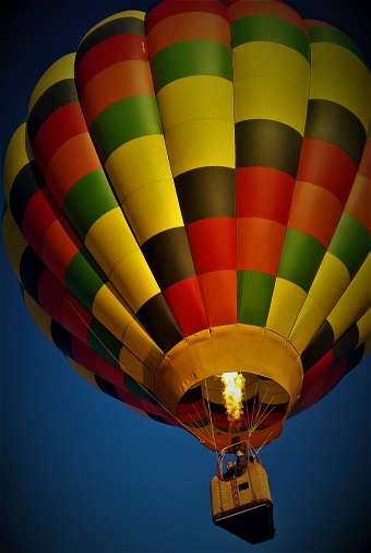 Hot air balloon using flame to take off