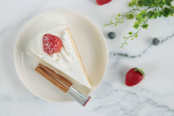 istock Christmas and birthday shortcakes on the table 1403350498