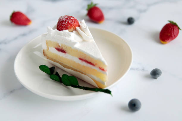istock Christmas and birthday shortcakes on the table 1403350499