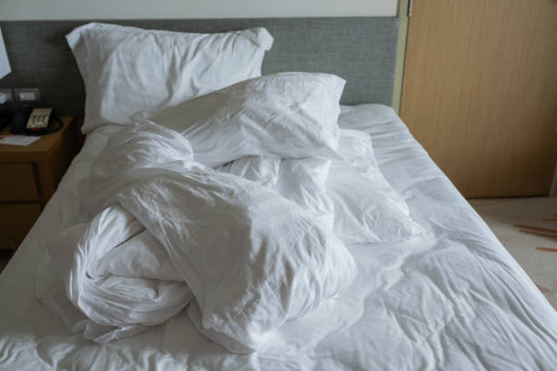 istock white bed background, after sleep, dirty bed 1403351253