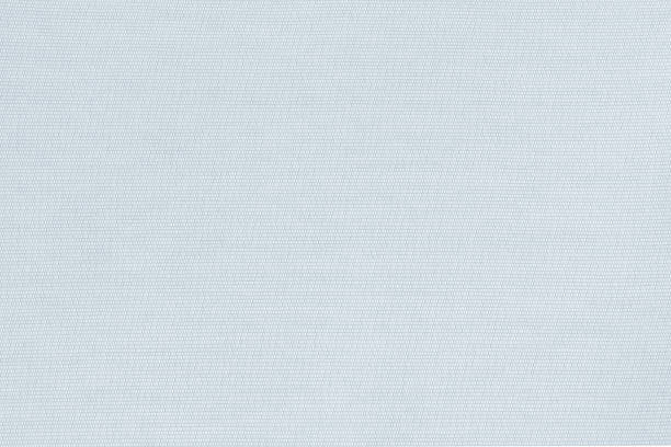 istock Cotton silk fabric wallpaper texture pattern background in light pastel pale grey blue 1403351281