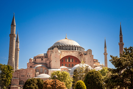 Picture of the Ayasofya camii mosque, also called Saint Sophia mosque. Hagia Sophia officially the Hagia Sophia Grand Mosque and formerly the Church of the Holy Wisdom is a Late Antique place of worship in Istanbul, designed by the Greek geometers Isidore of Miletus and Anthemius of Tralles. Built in 537 as the patriarchal cathedral of the imperial capital of Constantinople, it was the largest Christian church of the eastern Roman Empire (the Byzantine Empire) and the Eastern Orthodox Church, except during the Latin Empire from 1204 to 1261, when it temporarily became a Roman Catholic cathedral. In 1453, after the Fall of Constantinople to the Ottoman Empire, it was converted into a mosque. In 1935, the Republic of Turkey established it as a museum. In 2020, it was reconverted into a mosque.