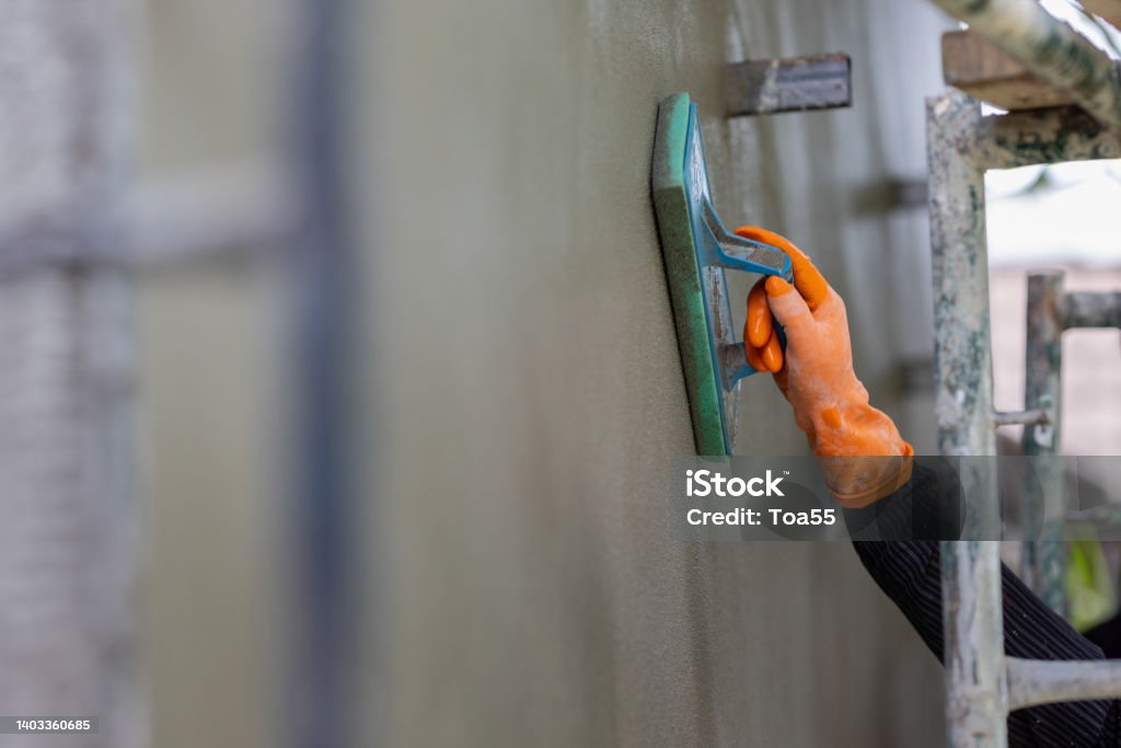 Float In Plastering Professional Contractor Plastering Wall With Sponge Float To Make A ...