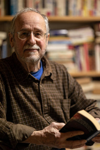 istock A senior gentleman in his book library portrait 1403365577