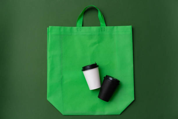 istock Textile shopping bag and coffee cup flat lay 1403368363