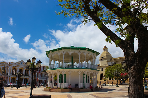 Puerto Plata, DR - May 10, 2022: The beautiful Central Park is the center piece of the city Puerto Plata where locals and tourist from around the world visit.