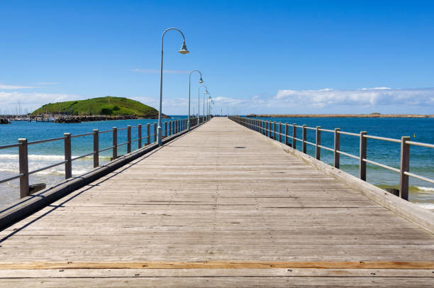 Jetty - Coffs Harbour Old timber jetty in the harbour - Coffs Harbour, NSW, Australia coffs harbour stock pictures, royalty-free photos & images