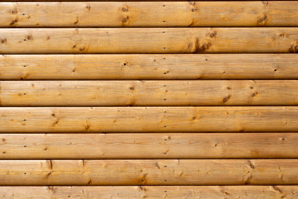 Log cabin exterior wall with joints for rugged old background. This cabin is in Wyoming, the old west, the wild west and in the United States of America (USA).