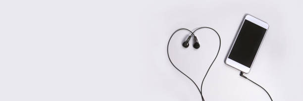 istock Podcast listeners connect. Online education concept. Smartphone accessory 1403384274