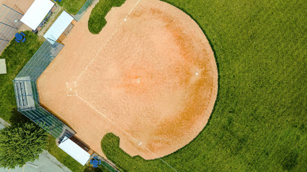 springtime baseball diamonds at rural park - baseball diamond baseball softball base imagens e fotografias de stock