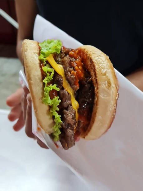 istock Big fresh homemade hamburger / burger 1403387780
